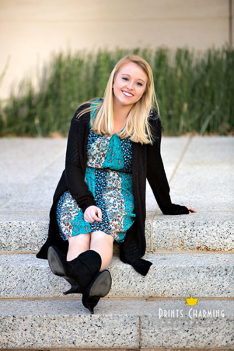 McKinsey's high school senior portrait photography outdoors smiling and sitting on marble stairs with modern landscaping McKR_5647