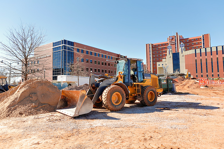 Heavy equipment working on new building site prep at St. Anthony Hospital in OKC