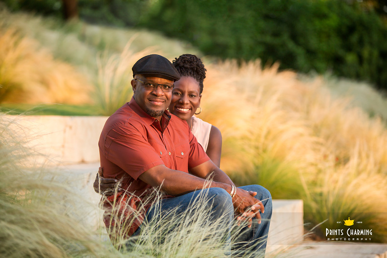 OKC couples portraits seated at sunset